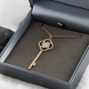 Gold Pendant With A Chain Key